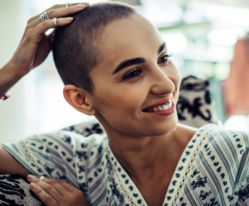 smiling-woman-with-shaved-head